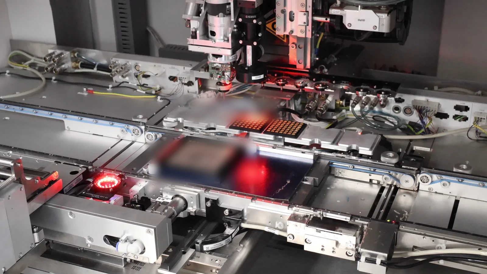 Red alignment lasers over the work area — precision marking and alignment