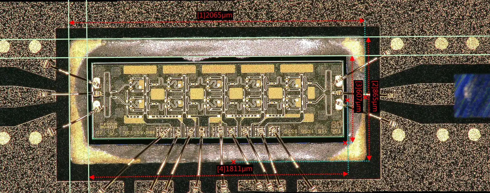 MMIC die with dimensional metrology annotations — Heisler Semiconductor