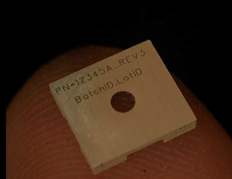 Laser-marked ceramic substrate coupon with lot traceability