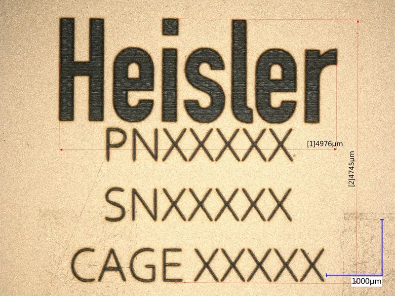 Laser-marked traceability on a substrate, 1000-micron scale — Heisler Semiconductor