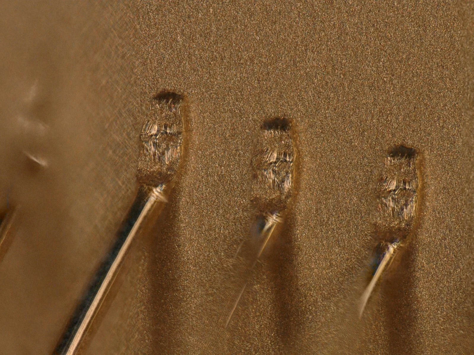 Bond-foot fracture at 3x magnification from pull-test qualification — Heisler Semiconductor