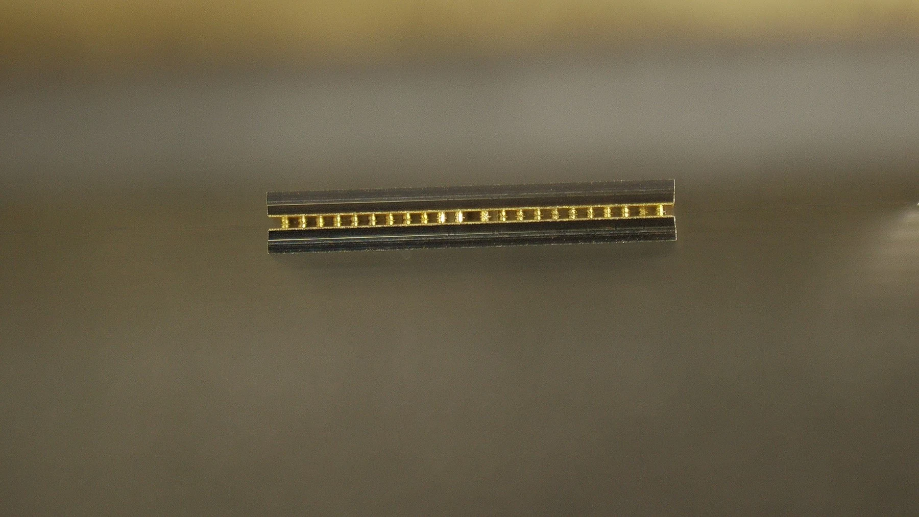 Maskless SAC305 solder bumps, side profile showing bump height — Heisler Semiconductor