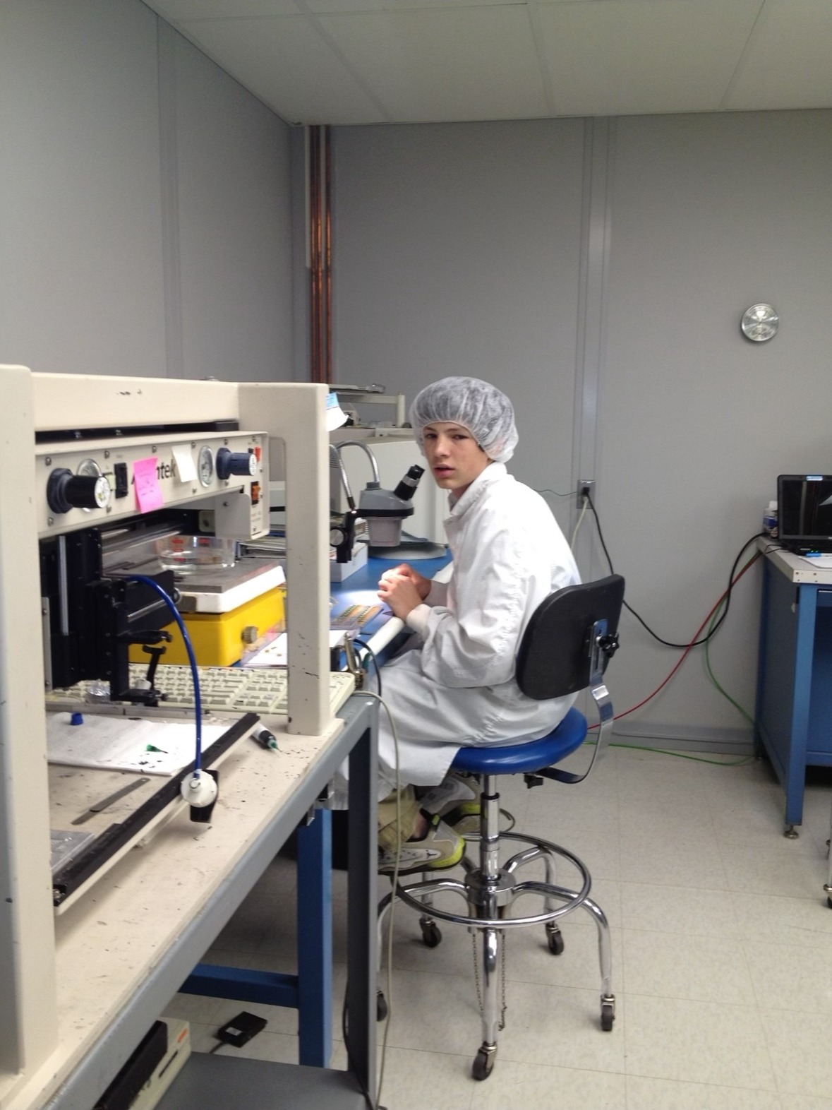 Jake Heisler at twelve years old at a cleanroom bench, learning die bonding and wire bonding at First Level in 2007